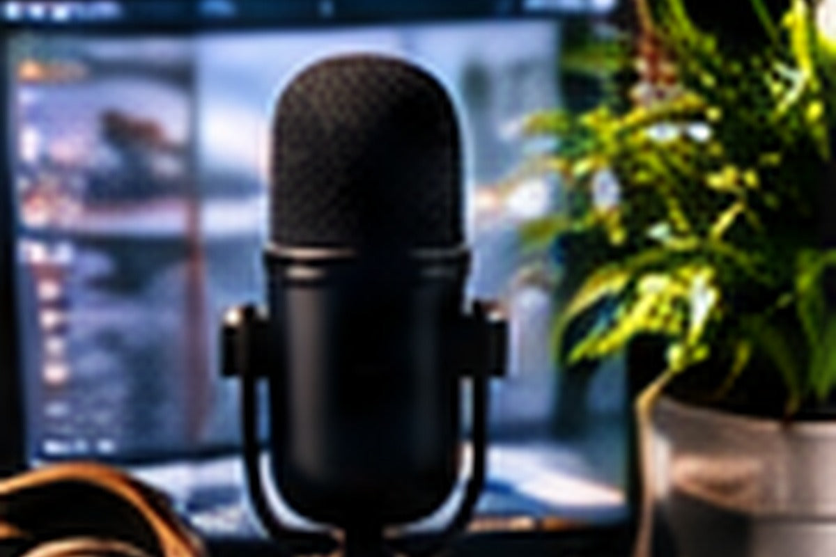 Microphone and creative workspace representing brand voice